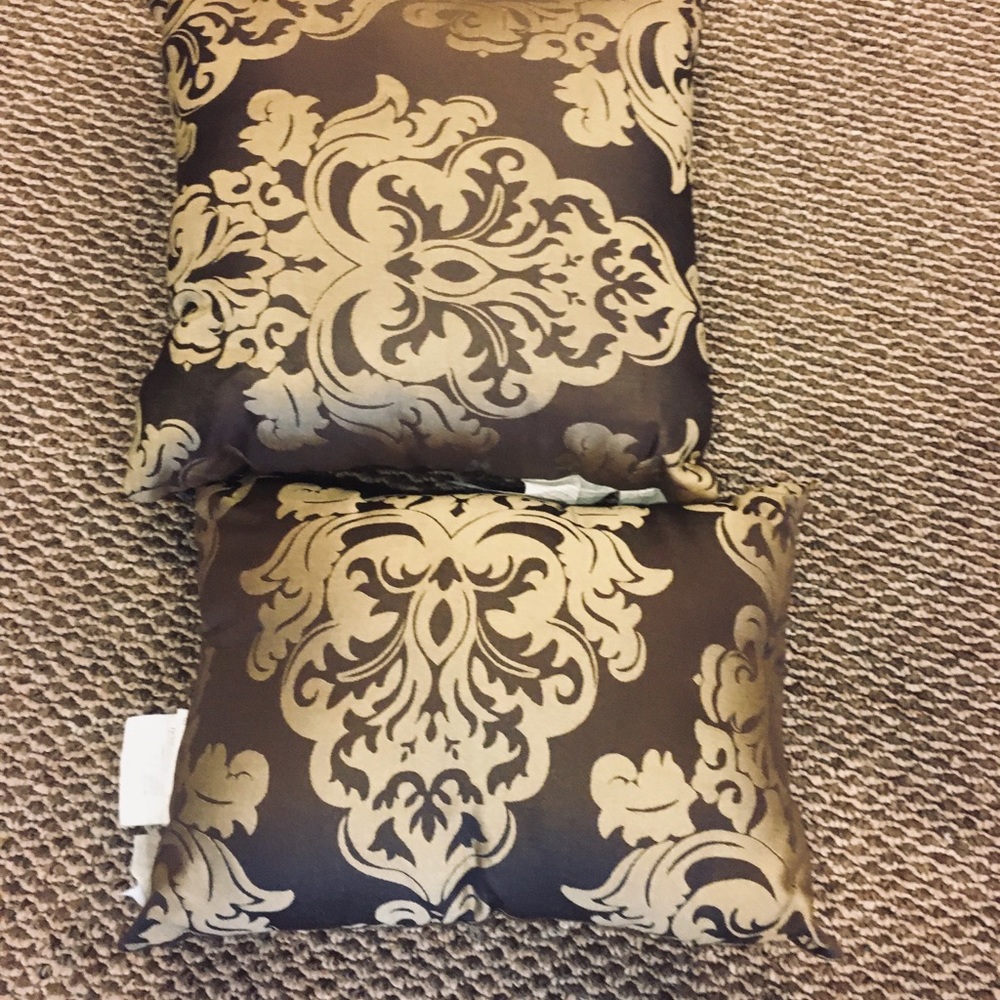 Brown and gold square pillow